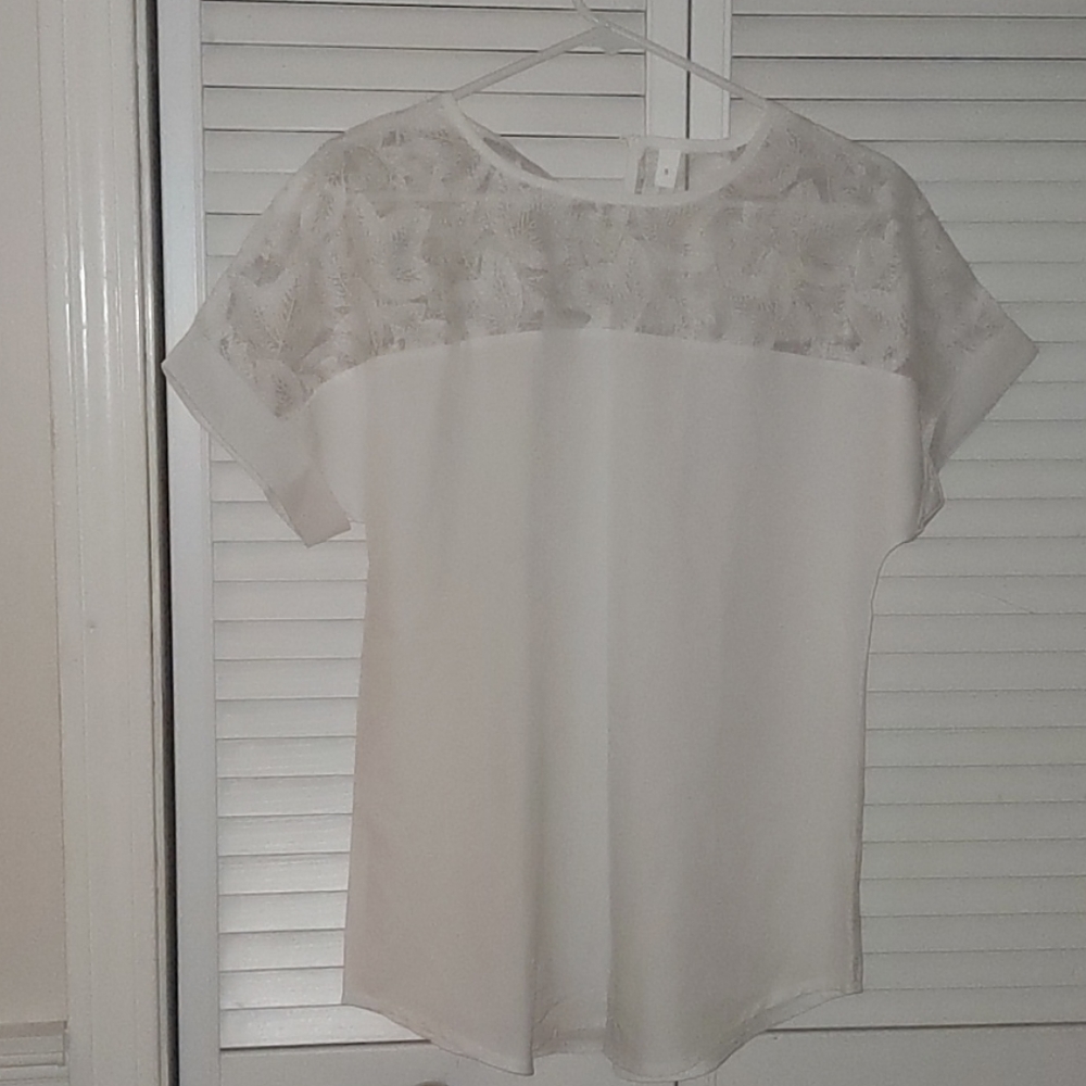 White blouse with lace on top